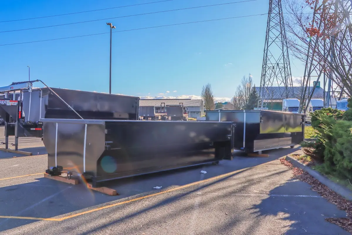 Roll-off dumpster ready for waste disposal at job site for Concrete Dumpster Rental in Bronxville